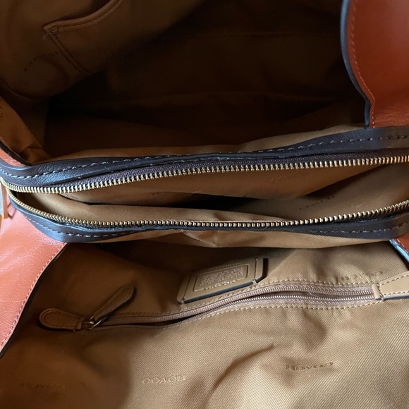 Barely used Tri~Color Coach Purse lots of pockets and zippers!